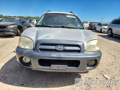 Piąte zdjęcie samochodu w środku: 2005 HYUNDAI SANTA FE GLS VIN:KM8SC13DX5U911825 - miniatura