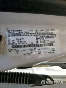 Zdjęcie 12 z 12 samochodu: 2017 FORD FOCUS TITANIUM VIN:1FADP3J22HL260740 - miniatura