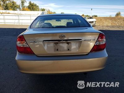 Zdjęcie 6 z 12 samochodu: 2003 TOYOTA CAMRY LE VIN:JTDBE32K130143182 - miniatura