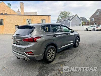 Czwarte zdjęcie samochodu z boku: 2019 HYUNDAI SANTA FE SE VIN:5NMS2CAD7KH044702 - miniatura