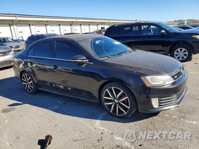 Czwarte zdjęcie samochodu z boku: 2014 VOLKSWAGEN JETTA GLI VIN:3VW4T7AJ7EM360716 - miniatura