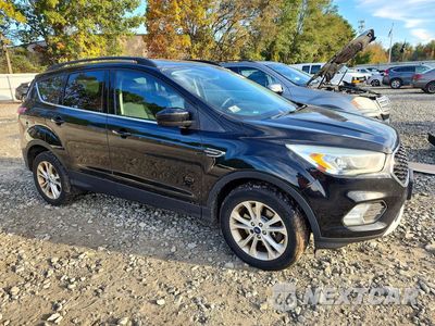Czwarte zdjęcie samochodu z boku: 2017 FORD ESCAPE SE VIN:1FMCU9GD3HUC30243 - miniatura