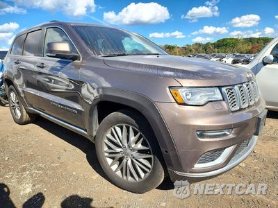 Czwarte zdjęcie samochodu z boku: 2017 JEEP GRAND CHEROKEE SUMMIT VIN:1C4RJFJGXHC803797 - miniatura