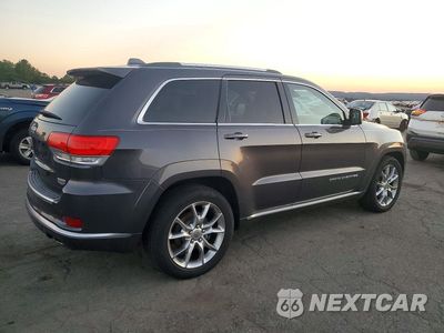 Trzecie zdjęcie samochodu z tyłu: 2015 JEEP GRAND CHEROKEE SUMMIT VIN:1C4RJFJM3FC732171 - miniatura