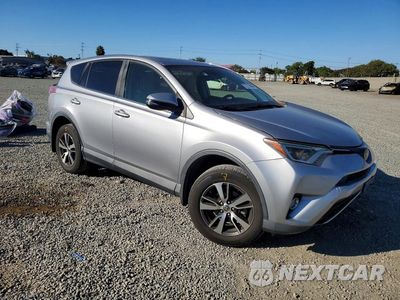 Czwarte zdjęcie samochodu z boku: 2018 TOYOTA RAV4 XLE VIN:JTMWFREV8JD127686 - miniatura