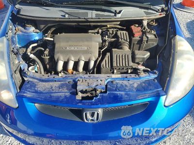 Zdjęcie 12 z 13 samochodu: 2007 HONDA FIT VIN:JHMGD38487S053621 - miniatura