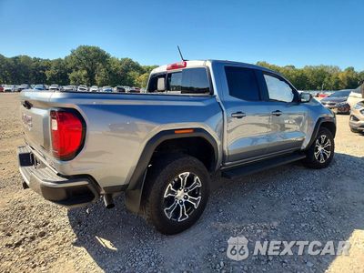 Trzecie zdjęcie samochodu z tyłu: 2024 GMC CANYON AT4 VIN:1GTP6DEK8R1222825 - miniatura