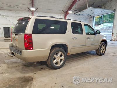 Trzecie zdjęcie samochodu z tyłu: 2013 CHEVROLET SUBURBAN K1500 LTZ VIN:1GNSKKE74DR283032 - miniatura