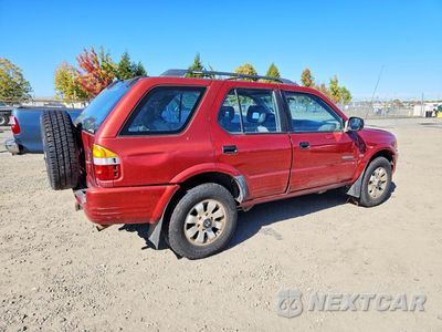 Trzecie zdjęcie samochodu z tyłu: 1999 HONDA PASSPORT EX VIN:4S6CM58W7X4426314 - miniatura