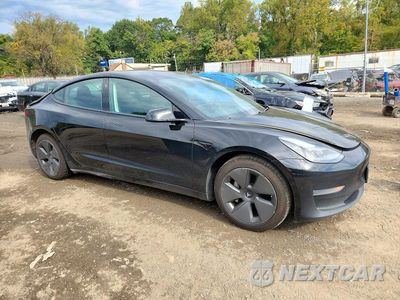 Czwarte zdjęcie samochodu z boku: 2021 TESLA MODEL 3 VIN:5YJ3E1EA3MF028467 - miniatura