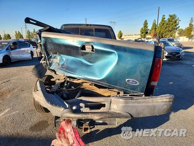 Zdjęcie 6 z 12 samochodu: 1999 FORD F250 SUPER DUTY VIN:1FTNF20LXXEB36692 - miniatura