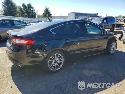 Trzecie zdjęcie samochodu z tyłu: 2016 FORD FUSION SE VIN:3FA6P0H93GR353924 - miniatura
