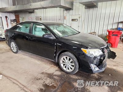Czwarte zdjęcie samochodu z boku: 2012 TOYOTA CAMRY HYBRID XLE VIN:4T1BD1FK9CU009882 - miniatura