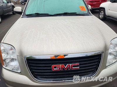 Zdjęcie 11 z 12 samochodu: 2013 GMC YUKON SLE VIN:1GKS2AE07DR153399 - miniatura