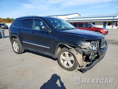Czwarte zdjęcie samochodu z boku: 2012 JEEP GRAND CHEROKEE LAREDO VIN:1C4RJFAG5CC332439 - miniatura