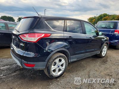 Trzecie zdjęcie samochodu z tyłu: 2016 FORD ESCAPE SE VIN:1FMCU0GX2GUA59294 - miniatura