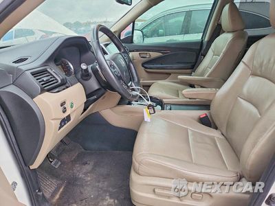 Zdjęcie 7 z 13 samochodu: 2016 HONDA PILOT TOURING VIN:5FNYF5H9XGB021760 - miniatura