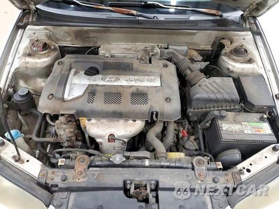 Zdjęcie 11 z 12 samochodu: 2004 HYUNDAI ELANTRA GLS VIN:KMHDN46DX4U755901 - miniatura