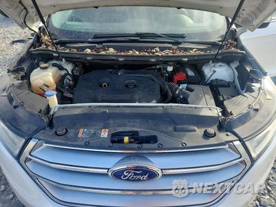 Zdjęcie 12 z 13 samochodu: 2015 FORD EDGE SEL VIN:2FMTK4J94FBB07633 - miniatura