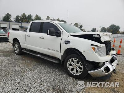 Czwarte zdjęcie samochodu z boku: 2017 NISSAN TITAN XD SV VIN:1N6AA1F24HN550264 - miniatura