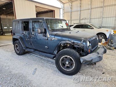 Czwarte zdjęcie samochodu z boku: 2008 JEEP WRANGLER UNLIMITED SAHARA VIN:1J4GA59138L557204 - miniatura