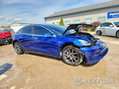 Czwarte zdjęcie samochodu z boku: 2019 TESLA MODEL 3 VIN:5YJ3E1EB3KF465150 - miniatura