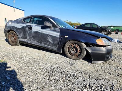 Czwarte zdjęcie samochodu z boku: 2004 HYUNDAI TIBURON GT VIN:KMHHN65FX4U118474 - miniatura