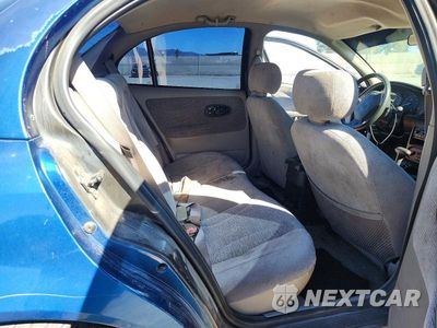 Zdjęcie 10 z 12 samochodu: 2000 SATURN SL2 VIN:1G8ZK5271YZ115863 - miniatura