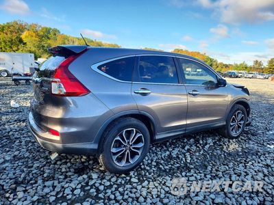 Trzecie zdjęcie samochodu z tyłu: 2015 HONDA CR-V LX VIN:5J6RM4H37FL071943 - miniatura