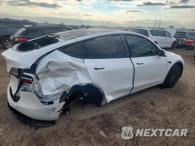 Trzecie zdjęcie samochodu z tyłu: 2021 TESLA MODEL Y VIN:5YJYGDEE0MF119250 - miniatura