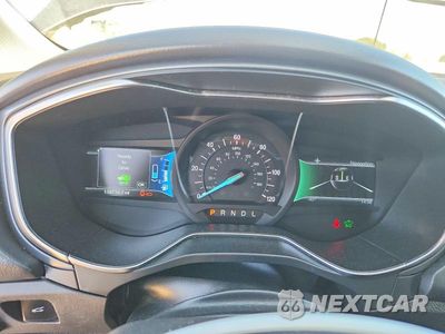 Zdjęcie 9 z 13 samochodu: 2013 FORD FUSION TITANIUM PHEV VIN:3FA6P0SU0DR332425 - miniatura