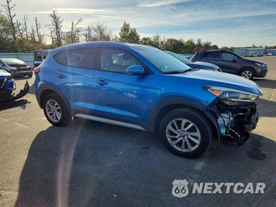 Czwarte zdjęcie samochodu z boku: 2017 HYUNDAI TUCSON SE VIN:KM8J3CA49HU485737 - miniatura