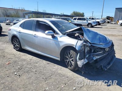 Czwarte zdjęcie samochodu z boku: 2024 TOYOTA CAMRY XLE VIN:4T1F11AK3RU877869 - miniatura