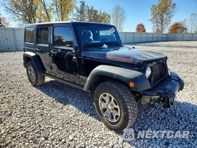 Czwarte zdjęcie samochodu z boku: 2017 JEEP WRANGLER UNLIMITED RUBICON VIN:1C4BJWFG0HL676133 - miniatura