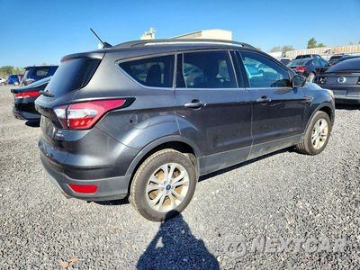 Trzecie zdjęcie samochodu z tyłu: 2018 FORD ESCAPE SE VIN:1FMCU9GD2JUB12125 - miniatura