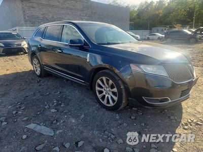 Czwarte zdjęcie samochodu z boku: 2014 LINCOLN MKT VIN:2LMHJ5AT4EBL53644 - miniatura