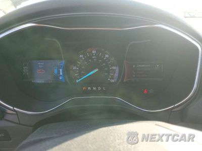 Zdjęcie 9 z 12 samochodu: 2014 FORD FUSION TITANIUM HEV VIN:3FA6P0RU8ER183642 - miniatura