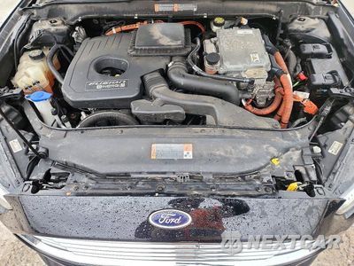 Zdjęcie 11 z 13 samochodu: 2016 FORD FUSION TITANIUM PHEV VIN:3FA6P0SU3GR121627 - miniatura