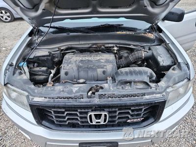 Zdjęcie 11 z 12 samochodu: 2012 HONDA RIDGELINE SPORT VIN:5FPYK1F73CB460788 - miniatura