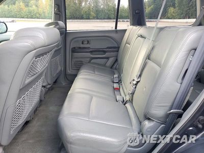 Zdjęcie 11 z 13 samochodu: 2004 HONDA PILOT EXL VIN:2HKYF18754H568858 - miniatura