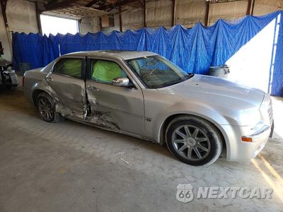 Czwarte zdjęcie samochodu z boku: 2005 CHRYSLER 300C VIN:2C3AA63HX5H126606 - miniatura