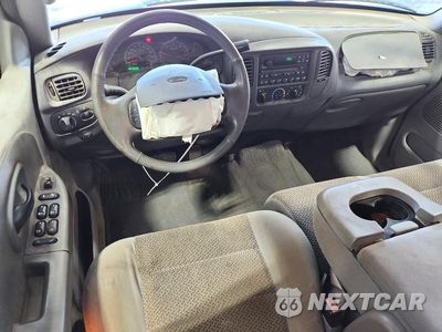 Zdjęcie 8 z 12 samochodu: 2002 FORD F150 SUPERCREW VIN:1FTRW08L72KC33210 - miniatura