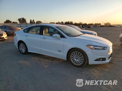 Czwarte zdjęcie samochodu z boku: 2016 FORD FUSION SE PHEV VIN:3FA6P0PU5GR166495 - miniatura