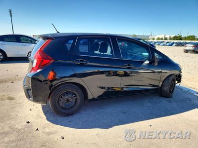 Trzecie zdjęcie samochodu z tyłu: 2015 HONDA FIT LX VIN:3HGGK5H51FM715477 - miniatura