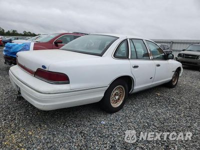 Trzecie zdjęcie samochodu z tyłu: 1997 FORD CROWN VICTORIA LX VIN:2FALP74W9PX107551 - miniatura