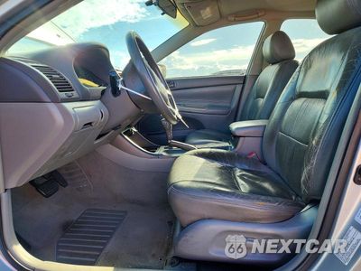 Zdjęcie 7 z 13 samochodu: 2003 TOYOTA CAMRY LE VIN:4T1BE32K43U788199 - miniatura