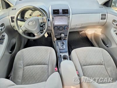 Zdjęcie 8 z 12 samochodu: 2009 TOYOTA COROLLA LE VIN:JTDBL40E299058042 - miniatura