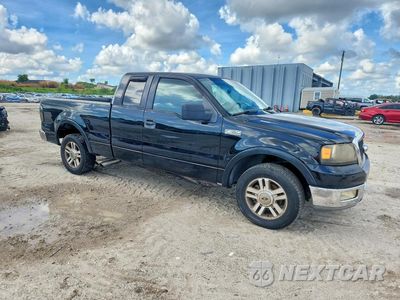 Czwarte zdjęcie samochodu z boku: 2005 FORD F150 VIN:1FTPX12555NA23163 - miniatura