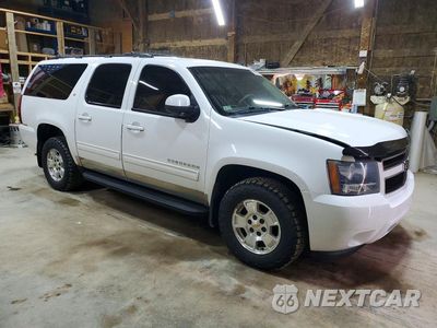 Czwarte zdjęcie samochodu z boku: 2010 CHEVROLET SUBURBAN K1500 LT VIN:1GNUKJE36AR116814 - miniatura