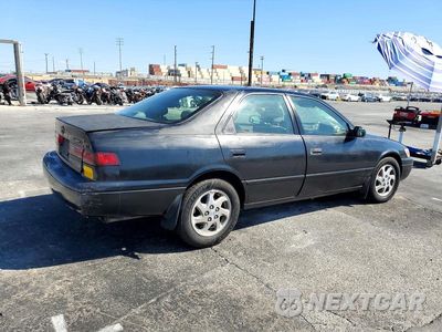 Trzecie zdjęcie samochodu z tyłu: 1997 TOYOTA CAMRY XLE V6 VIN:JT2BF22K9V0072073 - miniatura